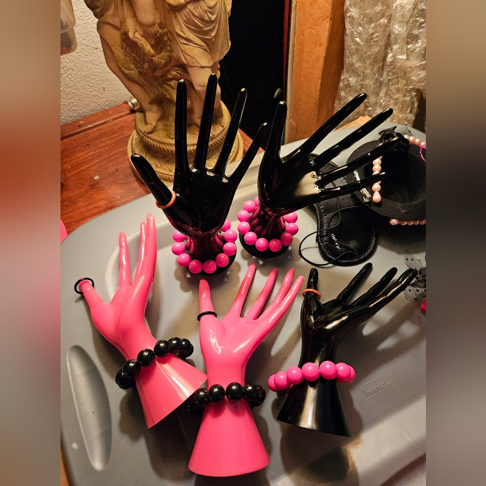 Decorative hands pink and black